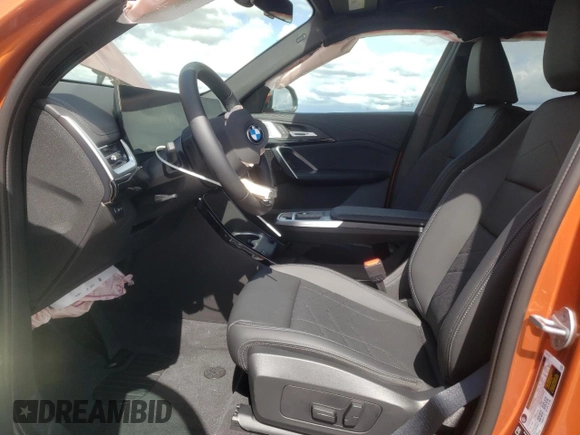 2025 BMW X1 xDrive28i with VIN WBX73EF03S5094250, listed as a Copart auction lot 51174465 with 51 mi miles and Salvage title. Bid and sale history available at DreamBid. Image 7.