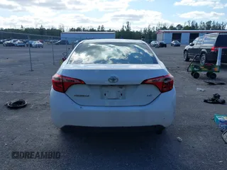 2018 Toyota Corolla L z VIN 5YFBURHE6JP849560, wystawiony jako IAAI lot #41321313 z przebiegiem 136 310 mil mil oraz . Historia ofert i sprzedaży dostępna na DreamBid. Obrazek 16.
