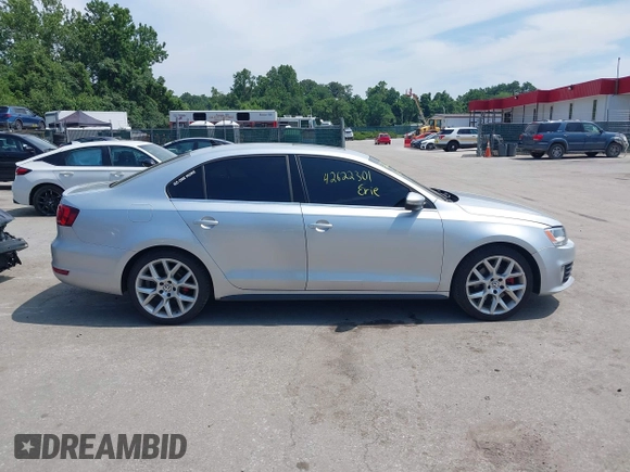 2014 Volkswagen Jetta GLI Autobahn with VIN 3VW5T7AJXEM310901, listed as a IAAI auction lot 42622301 with 139,821 mi miles and . Bid and sale history available at DreamBid. Image 13.