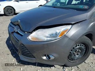 2012 Ford Focus SE with VIN 1FAHP3F27CL276208, listed as a IAAI auction lot 41995770 with 98,004 mi miles. Bid and sale history available at carsss.com. Image 12.