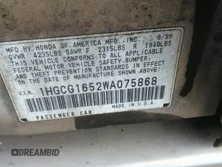 1998 Honda Accord EX z VIN 1HGCG1652WA075868, wystawiony jako IAAI lot #42240662 z przebiegiem 237 034 mil mil oraz . Historia ofert i sprzedaży dostępna na DreamBid. Obrazek 9.