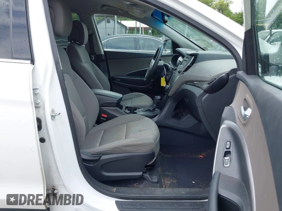 2014 Hyundai Santa Fe z VIN 5XYZTDLB5EG147354, wystawiony jako IAAI lot #42235940 z przebiegiem 107 466 mil mil oraz . Historia ofert i sprzedaży dostępna na DreamBid. Obrazek 5.