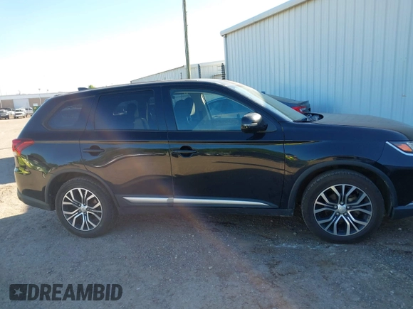 2018 Mitsubishi Outlander SE z VIN JA4AD3A32JJ003961, wystawiony jako IAAI lot #42297776 z przebiegiem 164 117 mil mil oraz . Historia ofert i sprzedaży dostępna na DreamBid. Obrazek 14.