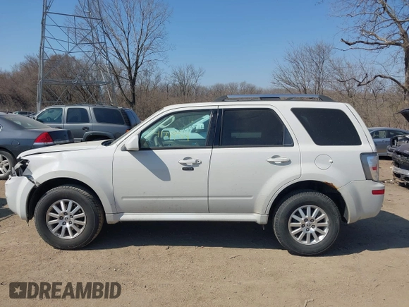 2010 Mercury Mariner Premier with VIN 4M2CN8HG5AKJ07771, listed as a IAAI auction lot 41779514 with 187,786 mi miles and . Bid and sale history available at DreamBid. Image 14.