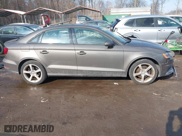 2015 Audi A3 Premium z VIN WAUACGFF1F1011816, wystawiony jako IAAI lot #41416552 z przebiegiem 116 736 mil mil oraz . Historia ofert i sprzedaży dostępna na DreamBid. Obrazek 13.