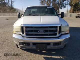 2002 Ford F-250 XL with VIN 1FTNX20L32ED10043, listed as a Copart auction lot 82608574 with 150,324 mi miles and Salvage title. Bid and sale history available at DreamBid. Image 5.