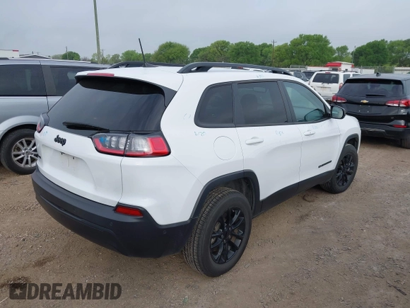 2023 Jeep Cherokee Altitude Lux with VIN 1C4PJMMB6PD112545, listed as a IAAI auction lot 41875820 with 53,559 mi miles. Bid and sale history available at carsss.com. Image 4.