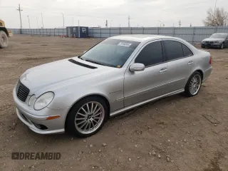 2005 Mercedes-Benz E-Class 5.5L AMG with VIN WDBUF76J05A730404, listed as a Copart auction lot 78168554 with 154,164 mi miles and Clean Title. Bid and sale history available at carsss.com. Image 1.