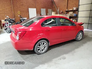 2012 Chevrolet Sonic LT z VIN 1G1JC5SH3C4140111, wystawiony jako Copart lot #57206595 z przebiegiem 126 223 mil mil oraz Szkoda całkowita • Salvage title. Historia ofert i sprzedaży dostępna na DreamBid. Obrazek 3.