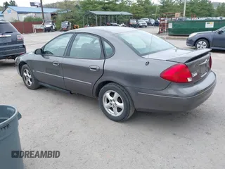 2003 Ford Taurus SES Standard with VIN 1FAFP55S63G176291, listed as a IAAI auction lot 42079514 with 173,623 mi miles. Bid and sale history available at carsss.com. Image 3.