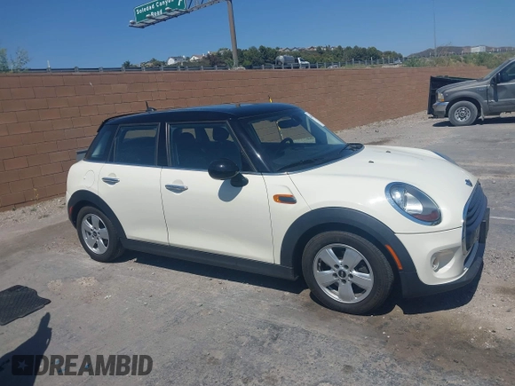 2016 MINI Hardtop 4 Door with VIN WMWXU1C56G2D10605, listed as a IAAI auction lot 42411431 with 35,367 mi miles and . Bid and sale history available at DreamBid. Image 12.