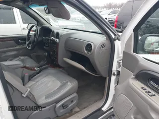 2003 GMC Envoy SLE with VIN 1GKDT13S732332171, listed as a IAAI auction lot 41520620 with 222,373 mi miles. Bid and sale history available at carsss.com. Image 5.