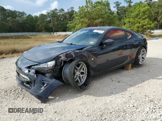 2017 Toyota 86 with VIN JF1ZNAA13H8709434, listed as a Copart auction lot 77629124 with 79,655 mi miles and Salvage Title. Bid and sale history available at carsss.com. Image 1.