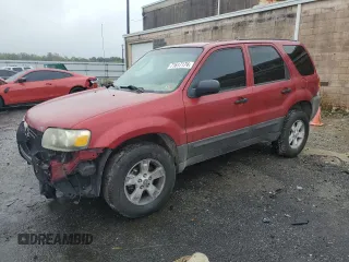 2005 Ford Escape XLT with VIN 1FMYU03175KA63888, listed as a Copart auction lot 71617174 with 145,107 mi miles and Salvage Title. Bid and sale history available at carsss.com. Image 1.