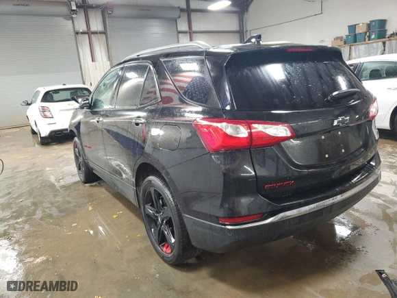2021 Chevrolet Equinox Premier with VIN 2GNAXNEV0M6148333, listed as a Copart auction lot 48521295 with 57,886 mi miles and Clean Title. Bid and sale history available at carsss.com. Image 2.