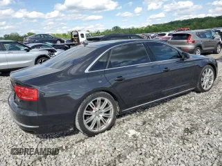 2014 Audi A8 4.0T с VIN WAUR2AFDXEN011628, выставлен на аукционе Copart как лот 55423285 с пробегом 94 681 миль миль и Списание • Salvage title. История ставок и продаж доступна на DreamBid. Изображение 3.