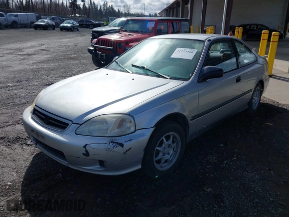1999 Honda Civic HX with VIN 1HGEJ7122XL020224, listed as a IAAI auction lot 41723460 with 202,759 mi miles. Bid and sale history available at carsss.com. Image 2.