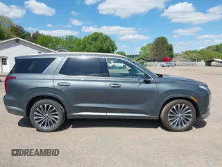 2023 Hyundai Palisade Calligraphy z VIN KM8R7DGE5PU499257, wystawiony jako IAAI lot #42231889 z przebiegiem 90 714 mil mil oraz . Historia ofert i sprzedaży dostępna na DreamBid. Obrazek 14.