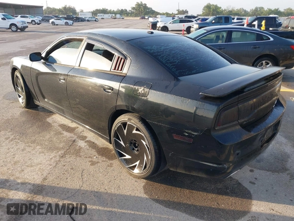 2013 Dodge Charger SE with VIN 2C3CDXBG5DH535058, listed as a IAAI auction lot 42101566 with 205,790 mi miles and . Bid and sale history available at DreamBid. Image 3.