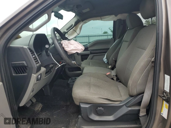 2018 Ford F-150 XL с VIN 1FTEW1E5XJFC79289, выставлен на аукционе Copart как лот 61224445 с пробегом 125 574 миль миль и Списание • Salvage title. История ставок и продаж доступна на DreamBid. Изображение 7.