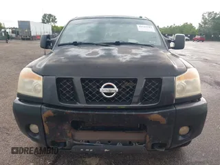 2009 Nissan Titan LE with VIN 1N6BA07CX9N318808, listed as a IAAI auction lot 42522212 with 276,410 mi miles and . Bid and sale history available at DreamBid. Image 12.