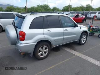 2005 Toyota RAV4 with VIN JTEGD20VX50047632, listed as a IAAI auction lot 41827122 with 214,716 mi miles. Bid and sale history available at carsss.com. Image 4.