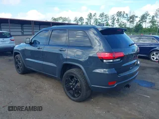 2018 Jeep Grand Cherokee Altitude with VIN 1C4RJFAG7JC394051, listed as a IAAI auction lot 42492771 with 147,669 mi miles and . Bid and sale history available at DreamBid. Image 3.