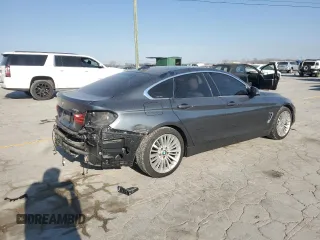2015 BMW 4 Series 428i with VIN WBA4A9C52FD416219, listed as a Copart auction lot 48703365 with 87,162 mi miles and Clean title. Bid and sale history available at DreamBid. Image 3.
