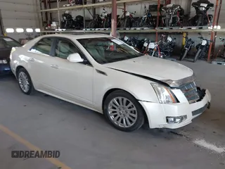 2010 Cadillac CTS Premium with VIN 1G6DS5EV8A0142811, listed as a IAAI auction lot 42562666 with 177,963 mi miles and . Bid and sale history available at DreamBid. Image 1.