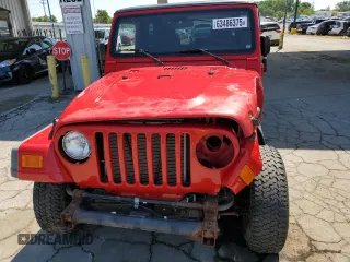 2005 Jeep Wrangler X with VIN 1J4FA39S35P360241, listed as a Copart auction lot 63486375 with 85,051 mi miles and Salvage title. Bid and sale history available at DreamBid. Image 5.