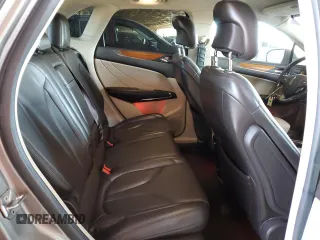 2017 Lincoln MKC Select z VIN 5LMCJ2C92HUL12902, wystawiony jako Copart lot #53994805 z przebiegiem 122 581 mil mil oraz Szkody całkowita. Historia ofert i sprzedaży dostępna na DreamBid. Obrazek 11.