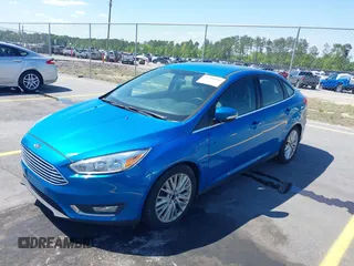 2015 Ford Focus Titanium with VIN 1FADP3J24FL322247, listed as a IAAI auction lot 41998030 with 151,341 mi miles and . Bid and sale history available at carsss.com. Image 2.