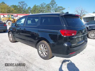 2019 Kia Sedona LX with VIN KNDMB5C1XK6537049, listed as a IAAI auction lot 41777727 with 86,987 mi miles. Bid and sale history available at carsss.com. Image 3.