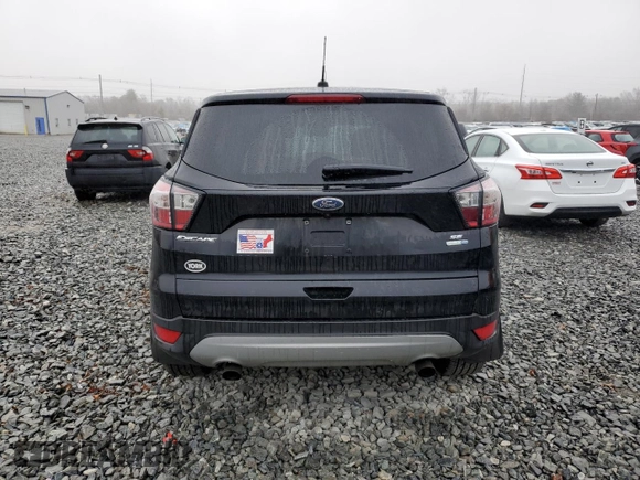 2017 Ford Escape SE with VIN 1FMCU9GD8HUC05564, listed as a Copart auction lot 49679275 with 88,344 mi miles and Salvage Title. Bid and sale history available at carsss.com. Image 6.
