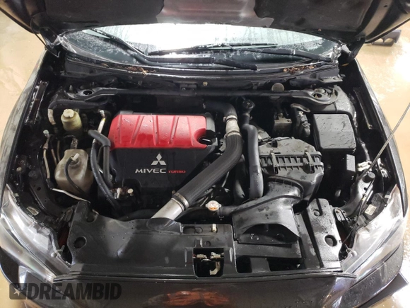 2013 Mitsubishi Lancer Evolution MR z VIN JA32W5FV5DU016540, wystawiony jako Copart lot #47615845 z przebiegiem 79 599 mil mil oraz Szkoda całkowita • Salvage title. Historia ofert i sprzedaży dostępna na DreamBid. Obrazek 11.