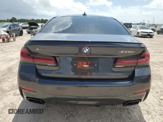 2022 BMW 5 Series M550i xDrive z VIN WBA13BK09NCJ00508, wystawiony jako Copart lot #58077634 z przebiegiem Nie podano mil oraz . Historia ofert i sprzedaży dostępna na DreamBid. Obrazek 6.