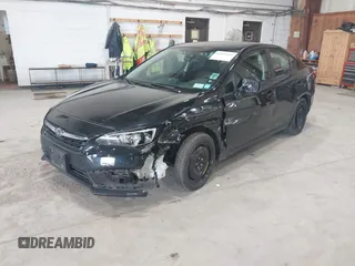2021 Subaru Impreza with VIN 4S3GKAB64M3601075, listed as a IAAI auction lot 42530164 with 90,522 mi miles and . Bid and sale history available at DreamBid. Image 2.