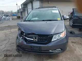 2016 Honda Odyssey Touring Elite z VIN 5FNRL5H99GB072860, wystawiony jako IAAI lot #42157603 z przebiegiem 221 449 mil mil oraz . Historia ofert i sprzedaży dostępna na DreamBid. Obrazek 12.