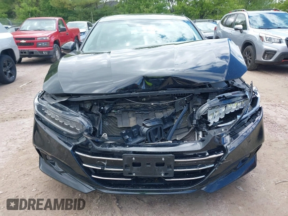 2021 Honda Accord Touring z VIN 1HGCV2F91MA022042, wystawiony jako IAAI lot #42301183 z przebiegiem 67 397 mil mil oraz . Historia ofert i sprzedaży dostępna na DreamBid. Obrazek 12.