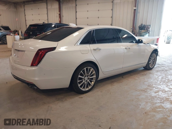 2017 Cadillac CT6 Luxury AWD z VIN 1G6KD5RS9HU203376, wystawiony jako IAAI lot #42181002 z przebiegiem Nie podano mil oraz . Historia ofert i sprzedaży dostępna na DreamBid. Obrazek 4.
