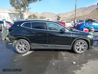 2019 BMW X2 xDrive28i with VIN WBXYJ5C52K5N24828, listed as a IAAI auction lot 41155049 with 59,597 mi miles. Bid and sale history available at carsss.com. Image 14.
