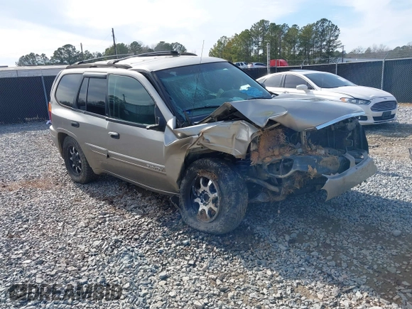 2003 GMC Envoy SLT with VIN 1GKDS13SX32203909, listed as a IAAI auction lot 41457713 with 199,507 mi miles. Bid and sale history available at carsss.com. Image 1.