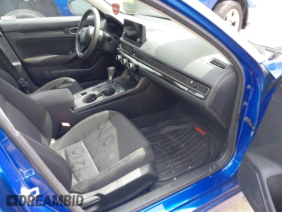 2022 Honda Civic LX z VIN 2HGFE2F27NH563406, wystawiony jako IAAI lot #42103175 z przebiegiem 69 488 mil mil oraz . Historia ofert i sprzedaży dostępna na DreamBid. Obrazek 5.