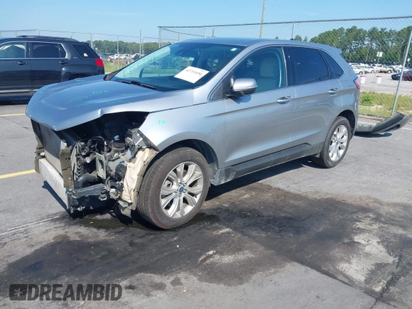 2021 Ford Edge Titanium with VIN 2FMPK3K97MBA15391, listed as a IAAI auction lot 42711656 with 40,723 mi miles and . Bid and sale history available at DreamBid. Image 19.