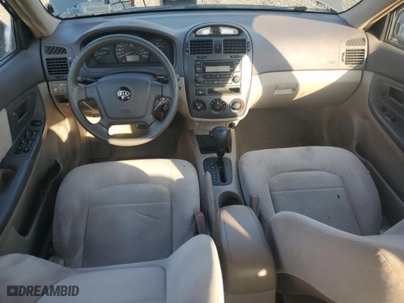 2006 Kia Spectra EX with VIN KNAFE122X65270684, listed as a Copart auction lot 73002454 with 79,326 mi miles and Salvage Title. Bid and sale history available at carsss.com. Image 8.