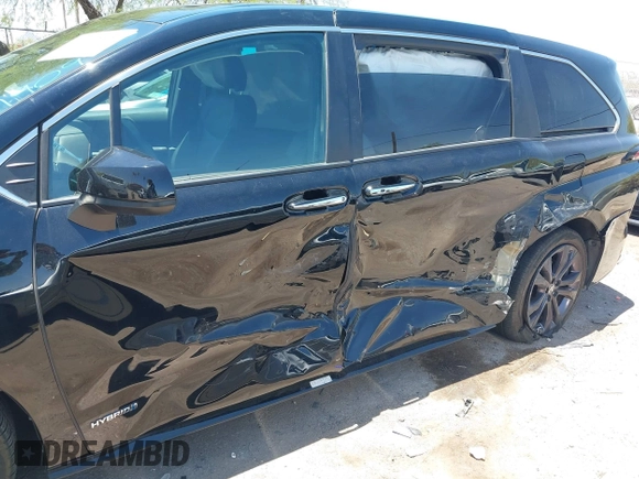 2021 Toyota Sienna XSE with VIN 5TDXRKEC6MS021909, listed as a IAAI auction lot 42432609 with 57,295 mi miles and . Bid and sale history available at DreamBid. Image 6.