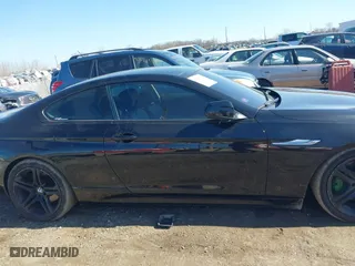2012 BMW 6 Series 650i xDrive with VIN WBALX5C59CC894030, listed as a IAAI auction lot 41763126 with 115,562 mi miles. Bid and sale history available at carsss.com. Image 13.