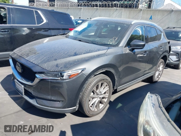 2020 Mazda CX-5 Grand Touring with VIN JM3KFADM3L1812649, listed as a IAAI auction lot 42575393 with 102,118 mi miles and . Bid and sale history available at DreamBid. Image 18.