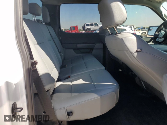 2023 Ford F-150 XL with VIN 1FTEW1C5XPKF56011, listed as a Copart auction lot 50724605 with 25,420 mi miles and Salvage title. Bid and sale history available at DreamBid. Image 10.