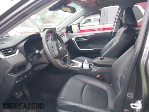 2023 Toyota RAV4 Hybrid XLE Premium with VIN 4T3B6RFV9PU117919, listed as a IAAI auction lot 42528322 with 27,236 mi miles and . Bid and sale history available at DreamBid. Image 19.